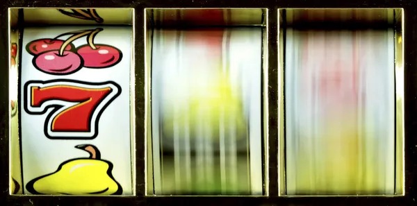Fortune Rabbit slot game symbols and spinning reels on mobile phone screen